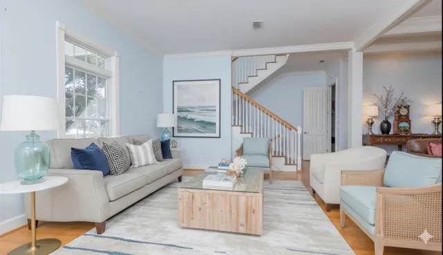 a view of a porch with furniture and next to a window