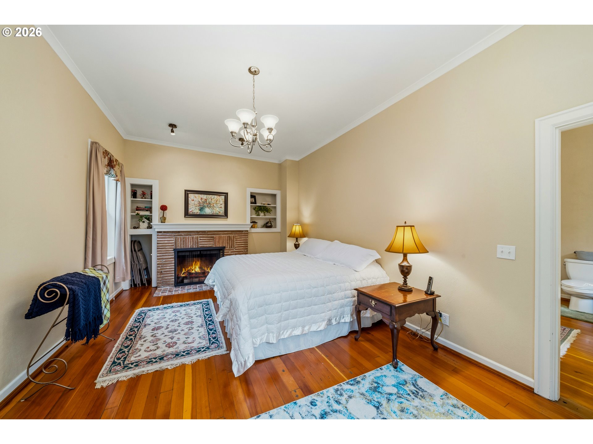 36725 North Highway 101 Nehalem, OR 97131 - Photo 12 of 40 a bedroom with furniture and a wooden floor