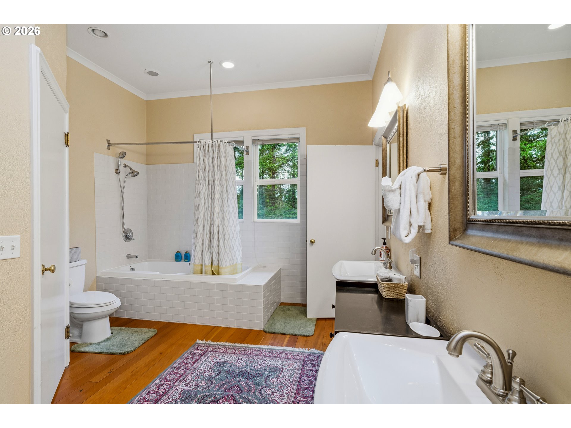 36725 North Highway 101 Nehalem, OR 97131 - Photo 15 of 40 a bathroom with a sink a toilet and shower