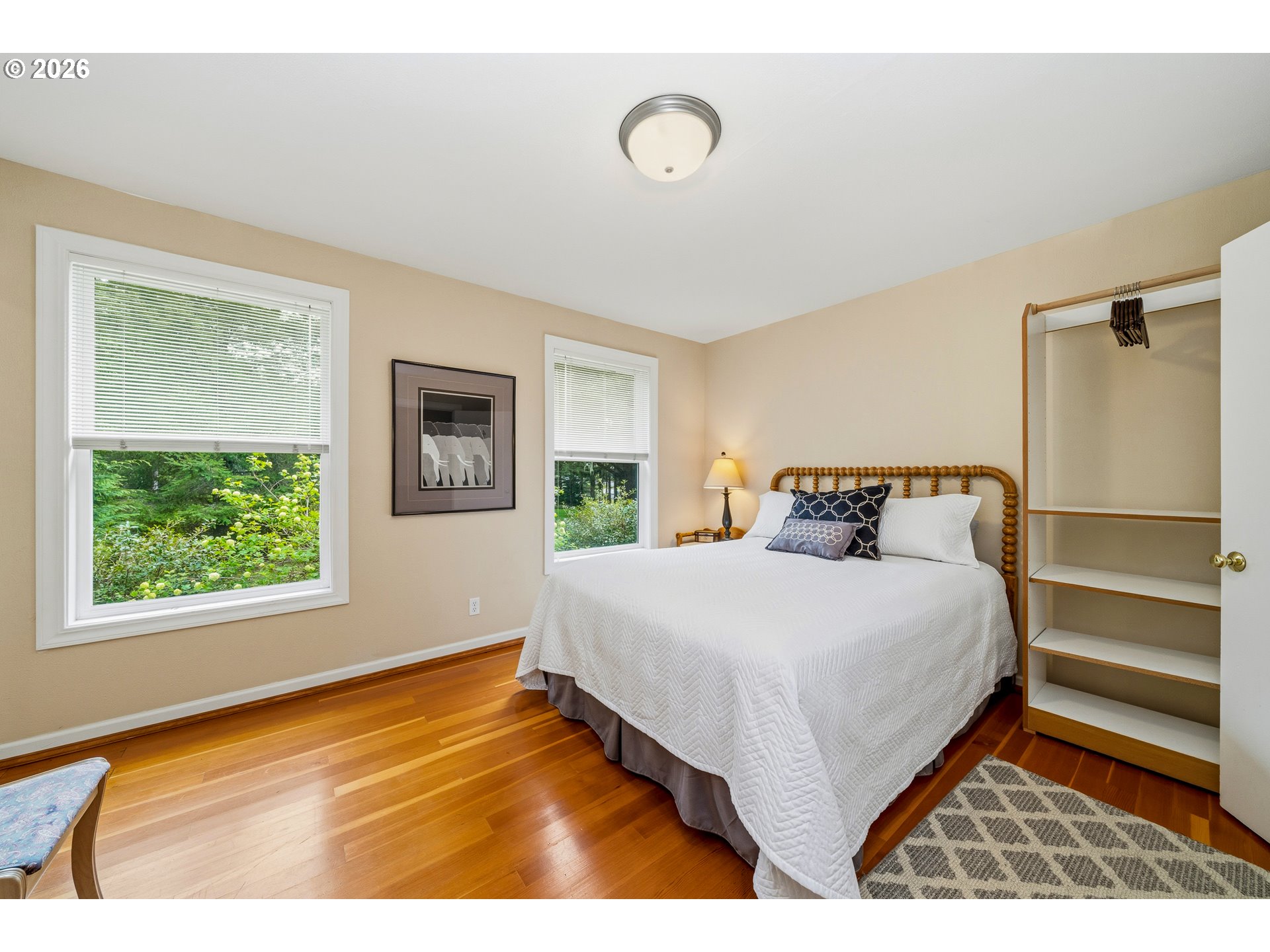 36725 North Highway 101 Nehalem, OR 97131 - Photo 16 of 40 a bedroom with a bed and a window