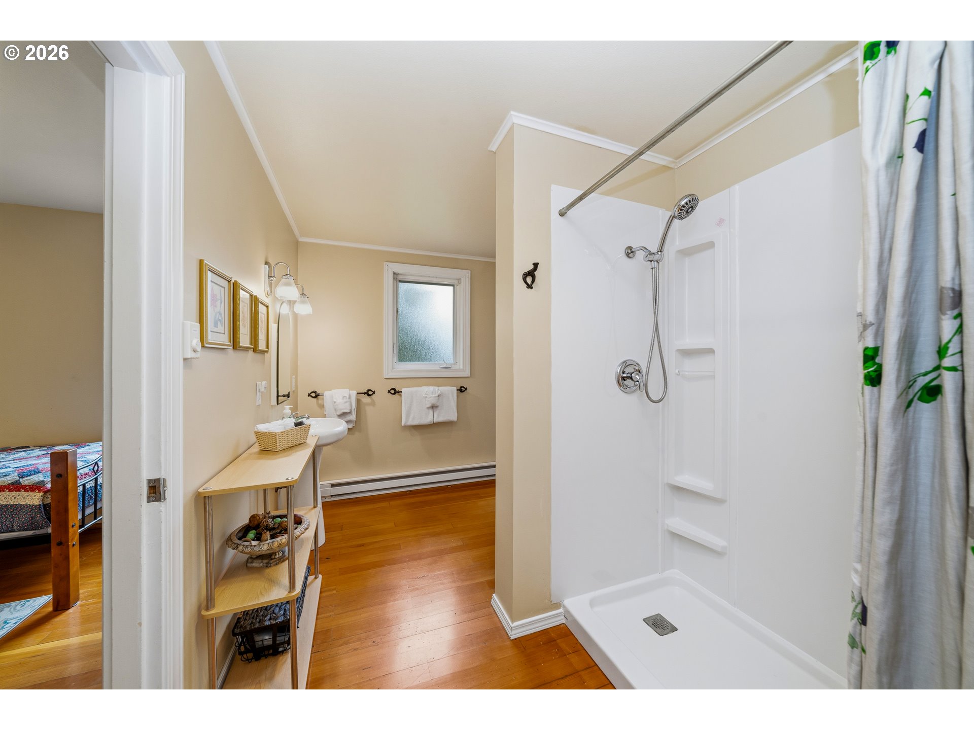 36725 North Highway 101 Nehalem, OR 97131 - Photo 22 of 40 a bathroom with a glass shower door