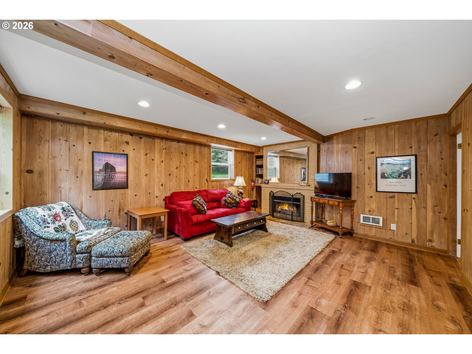36725 North Highway 101 Nehalem, OR 97131 - Photo 26 of 40 a living room with furniture and a flat screen tv