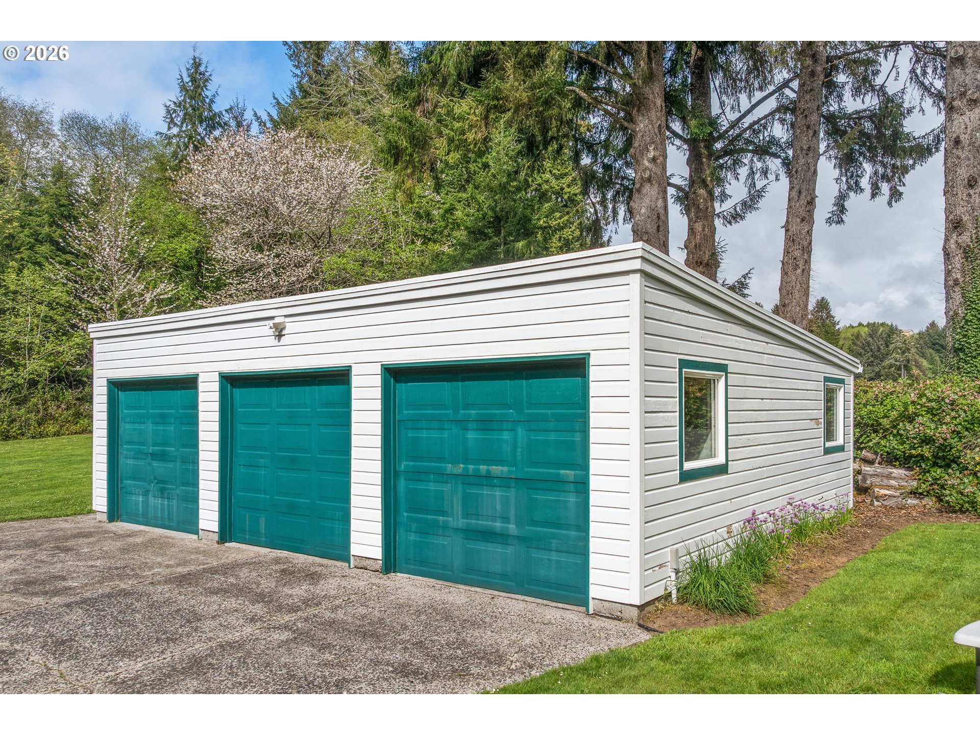 36725 North Highway 101 Nehalem, OR 97131 - Photo 34 of 40 a view of a house with a backyard