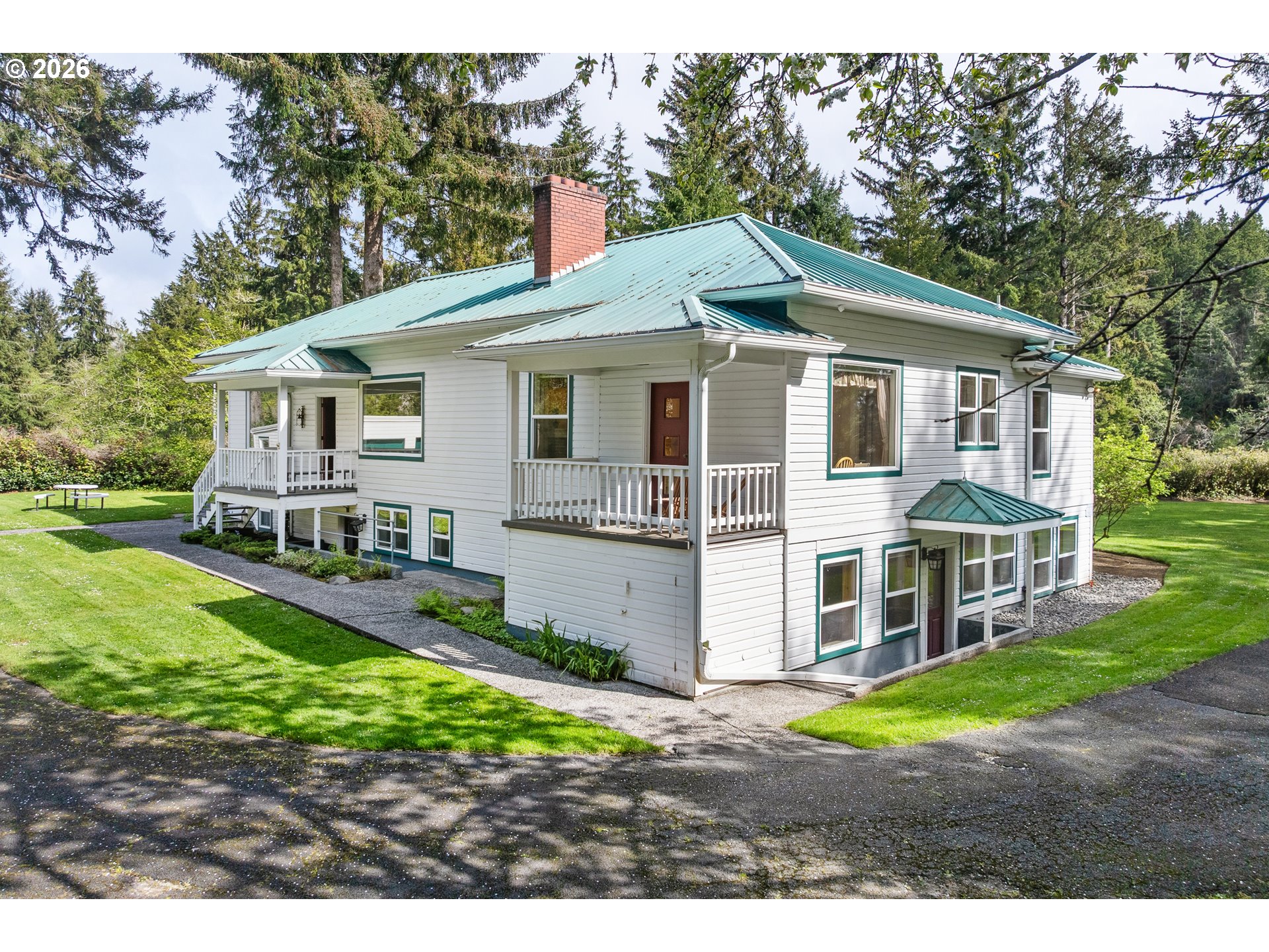 36725 North Highway 101 Nehalem, OR 97131 - Photo 5 of 40 a front view of a house with a yard