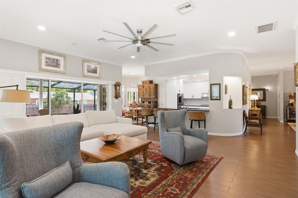 2351 Northeast Coachman Road Clearwater, FL 33765 - Photo 15 of 47 a living room with furniture and a large window