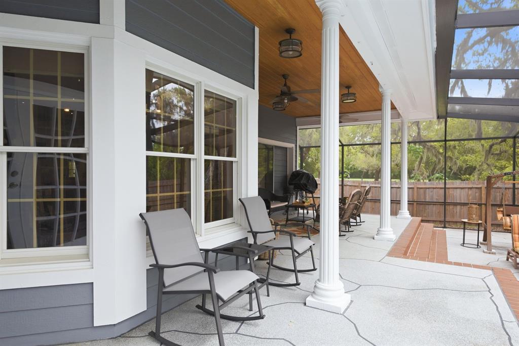 2351 Northeast Coachman Road Clearwater, FL 33765 - Photo 41 of 47 a view of a living room and a balcony