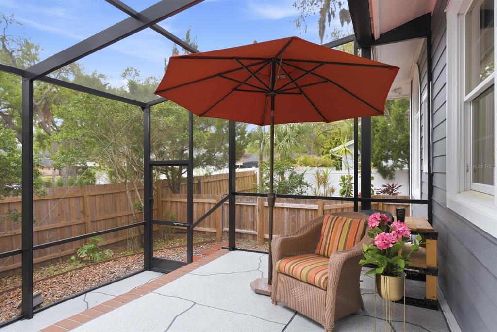 2351 Northeast Coachman Road Clearwater, FL 33765 - Photo 42 of 47 a view of a chair and tables in the balcony