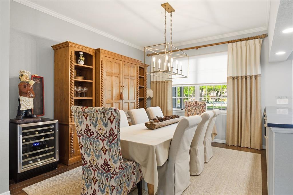 2351 Northeast Coachman Road Clearwater, FL 33765 - Photo 10 of 47 a view of a dining room with furniture window and outside view
