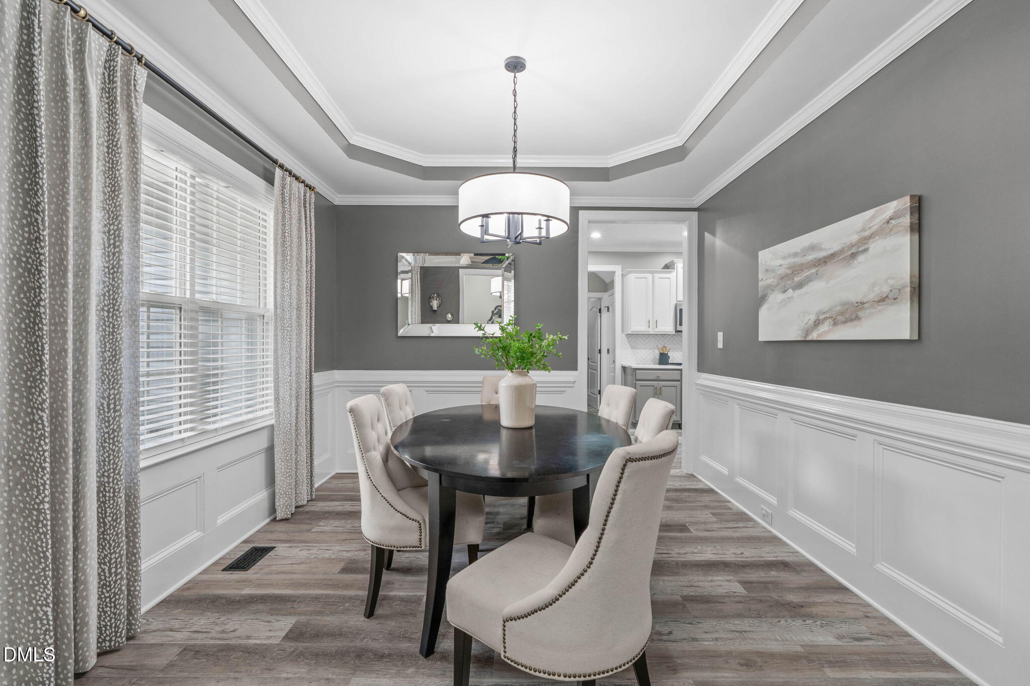 2450 Rolling Tracks Road Willow Spring, NC 27592 - Photo 10 of 64 a view of a dining room with furniture window and wooden floor