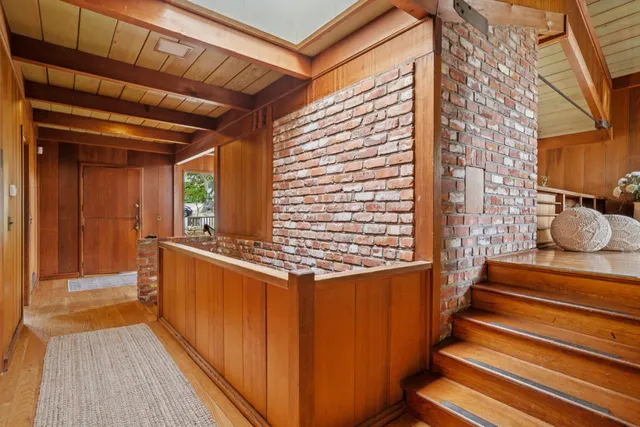 a view of entryway with wooden floor