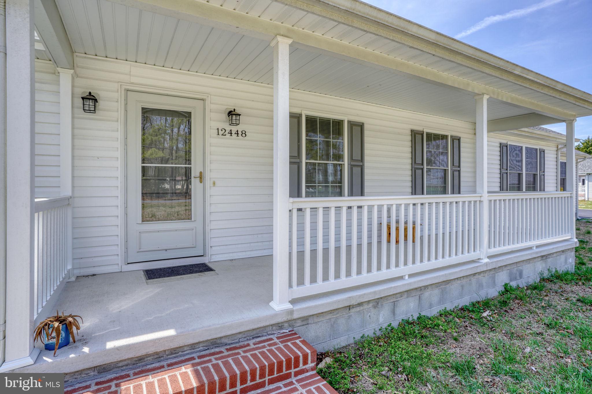 12448 Deer Forest Road Bridgeville, DE 19933 - Photo 11 of 44 Charming porch welcomes you home.