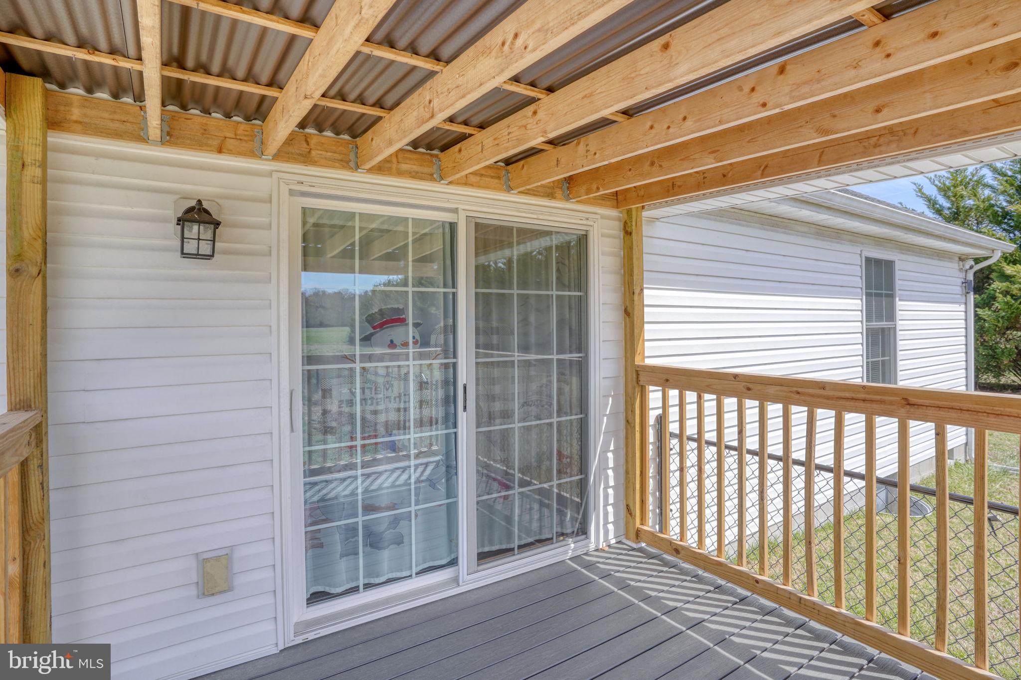 12448 Deer Forest Road Bridgeville, DE 19933 - Photo 15 of 44 Charming porch with serene views.