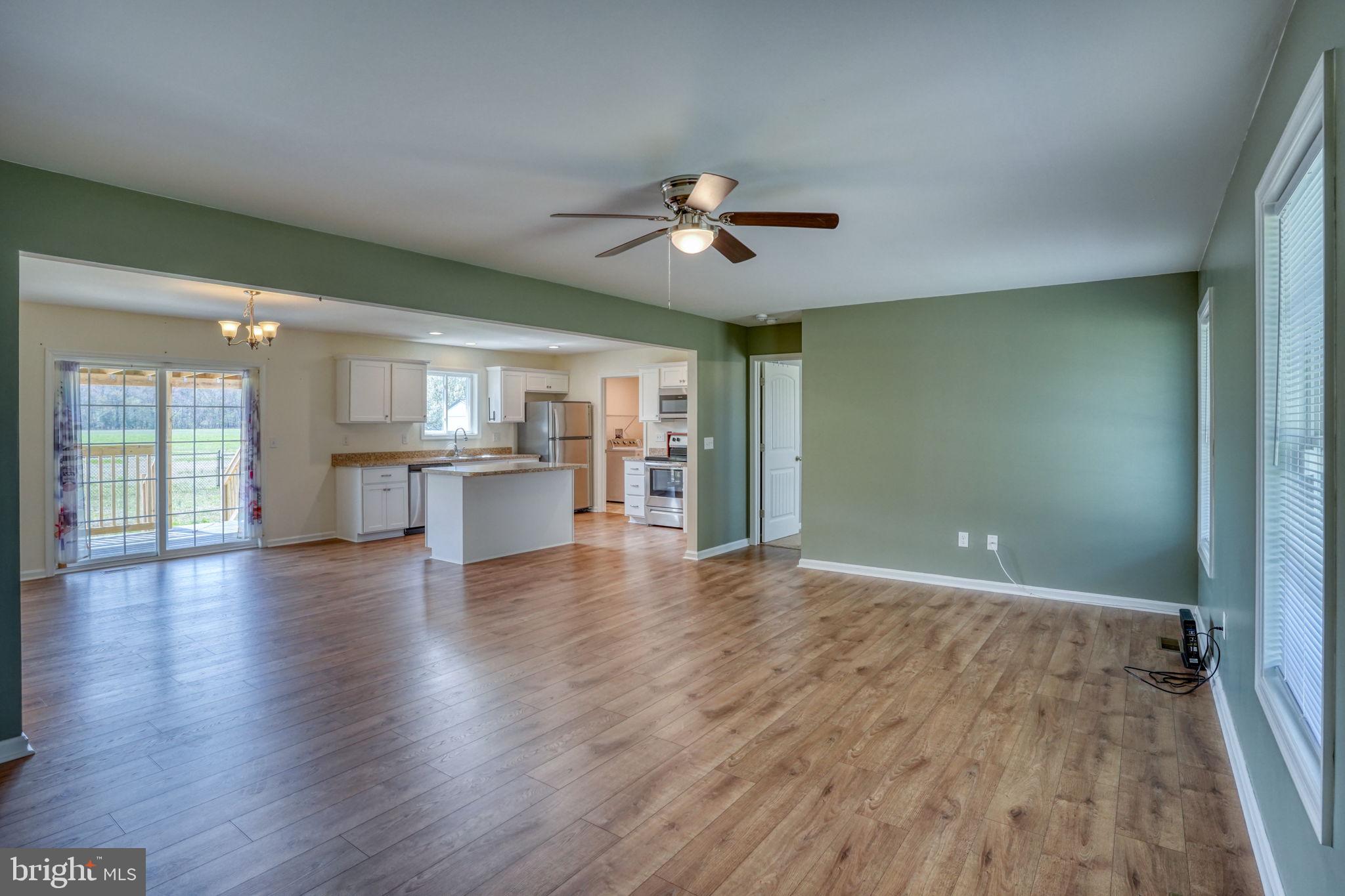 12448 Deer Forest Road Bridgeville, DE 19933 - Photo 16 of 44 Spacious open-concept living area.