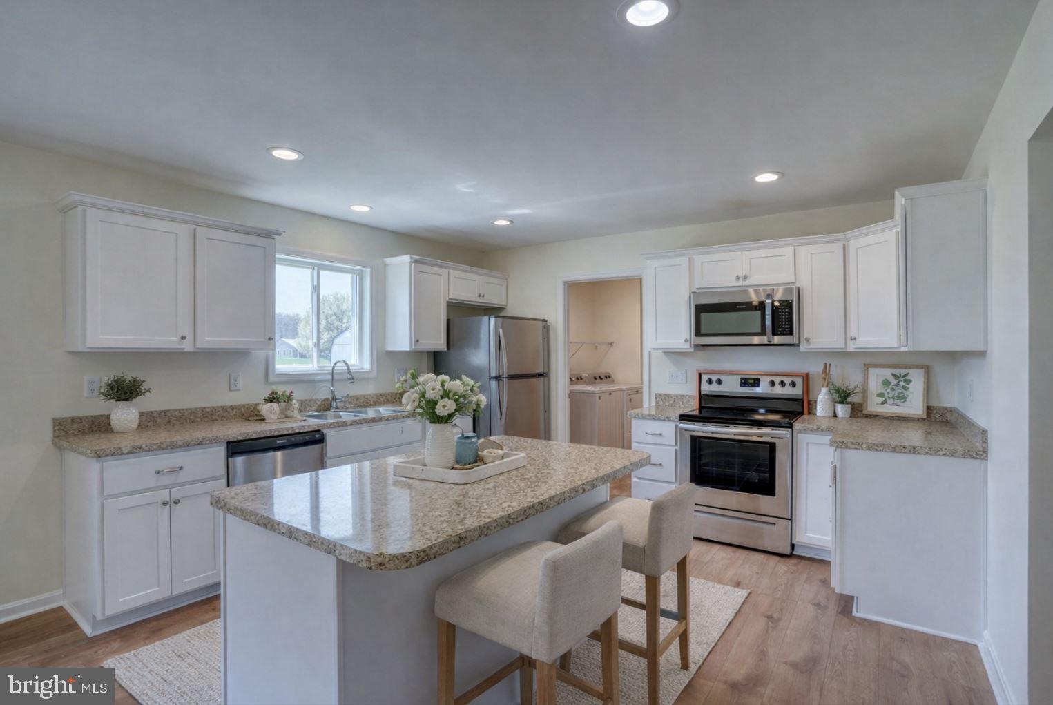 12448 Deer Forest Road Bridgeville, DE 19933 - Photo 23 of 44 Bright and airy modern kitchen space.
