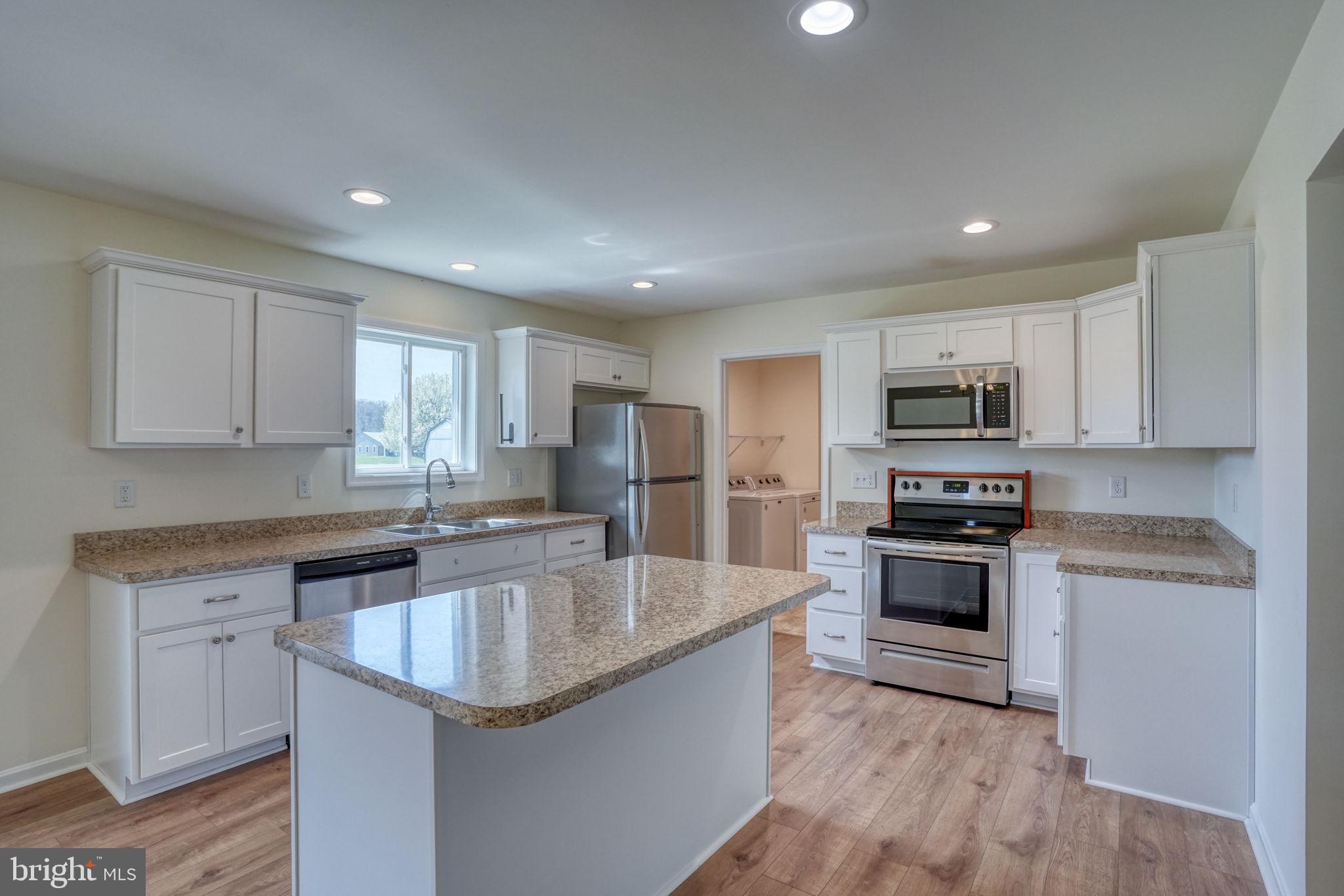 12448 Deer Forest Road Bridgeville, DE 19933 - Photo 24 of 44 Bright and modern kitchen oasis.