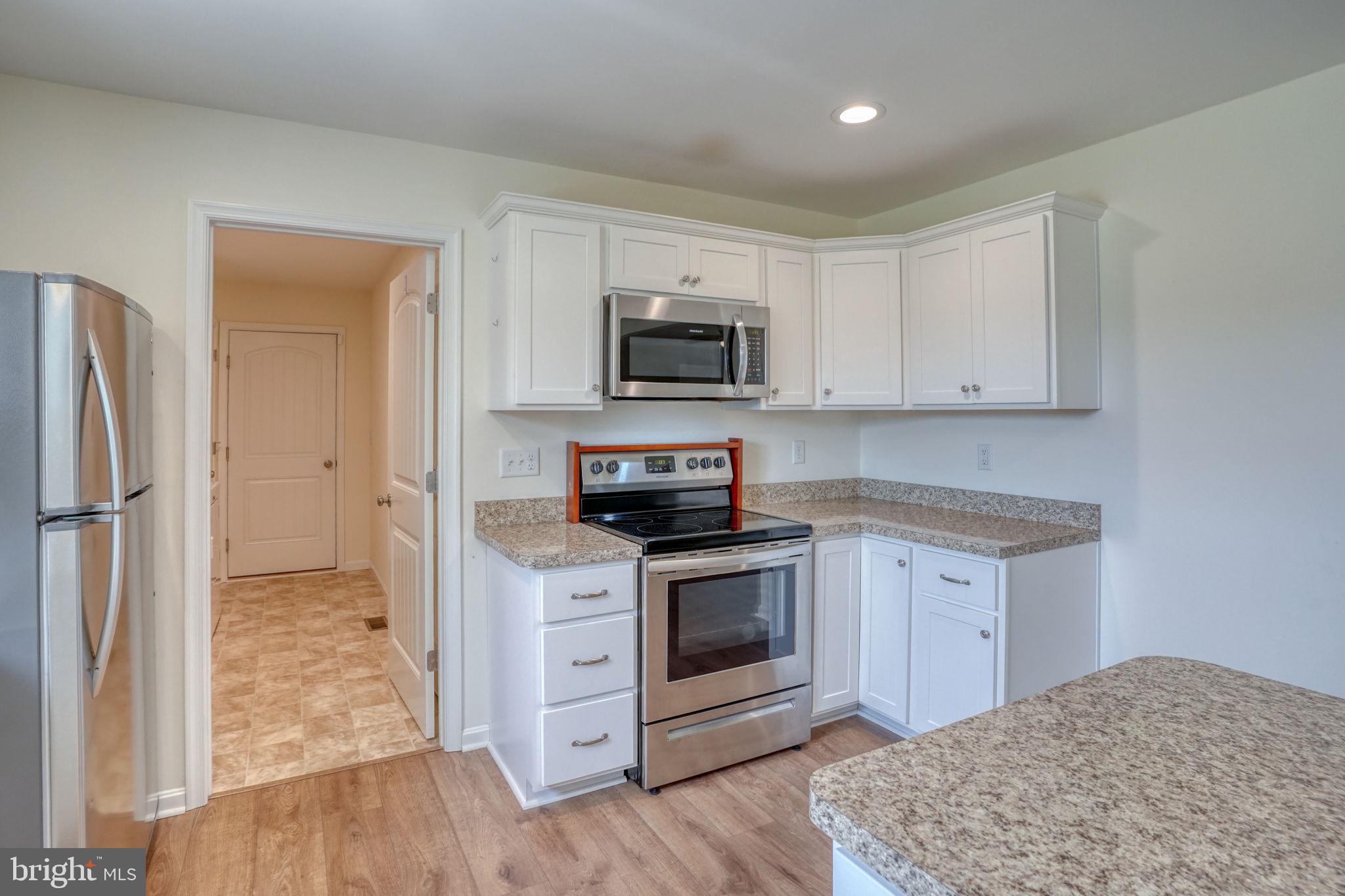 12448 Deer Forest Road Bridgeville, DE 19933 - Photo 29 of 44 Modern kitchen with sleek finishes.