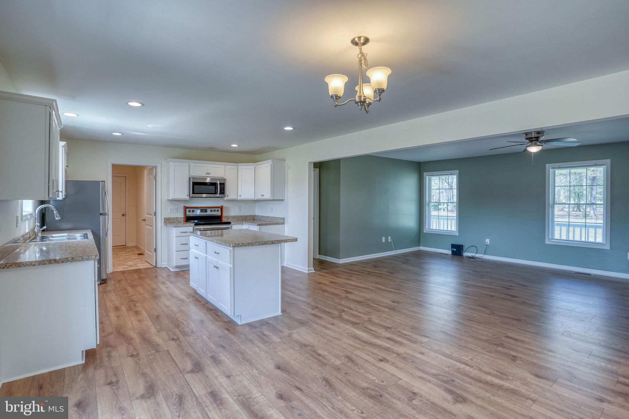 12448 Deer Forest Road Bridgeville, DE 19933 - Photo 30 of 44 Spacious open-concept living area.