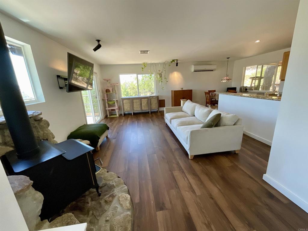 38281 Western Hills Road Anza, CA 92539 - Photo 13 of 75 a living room with furniture and a wooden floor