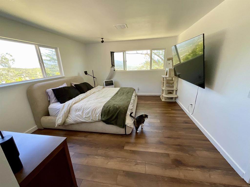 38281 Western Hills Road Anza, CA 92539 - Photo 19 of 75 a living room with furniture and a flat screen tv