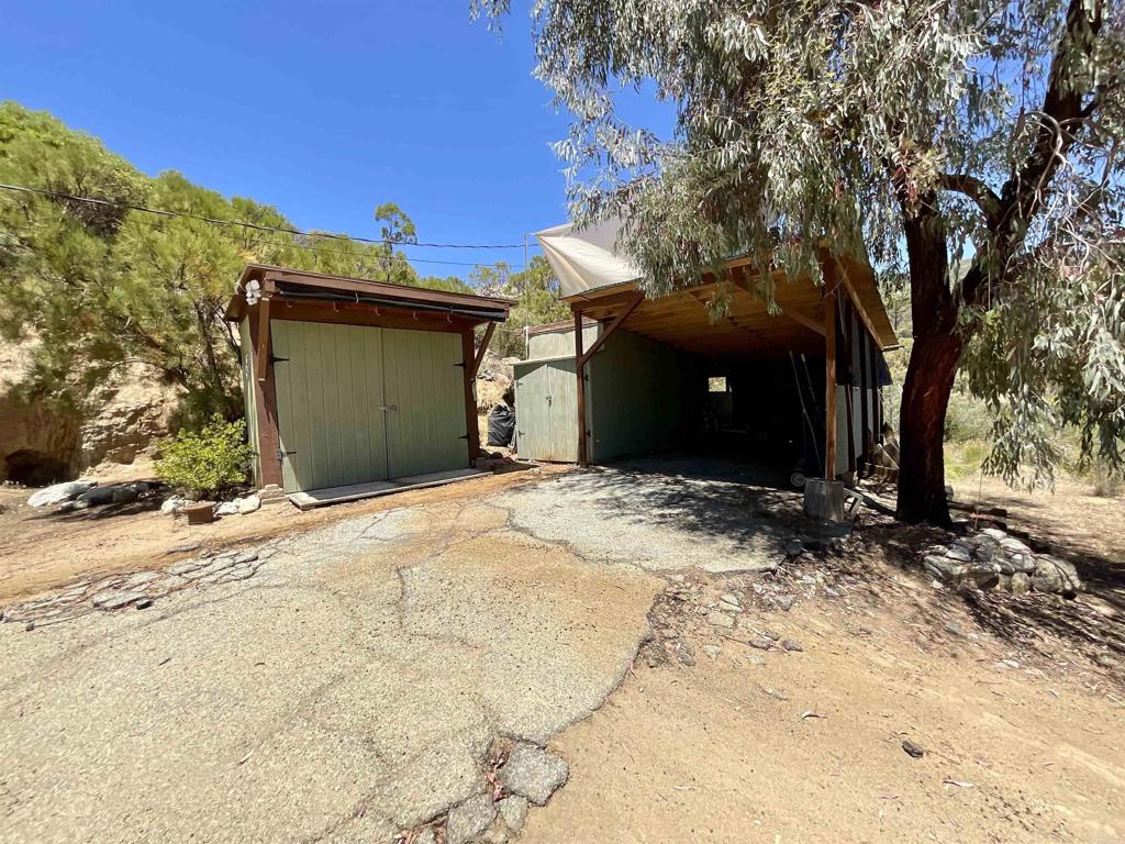 38281 Western Hills Road Anza, CA 92539 - Photo 33 of 75 a view of a house with a snow in the yard