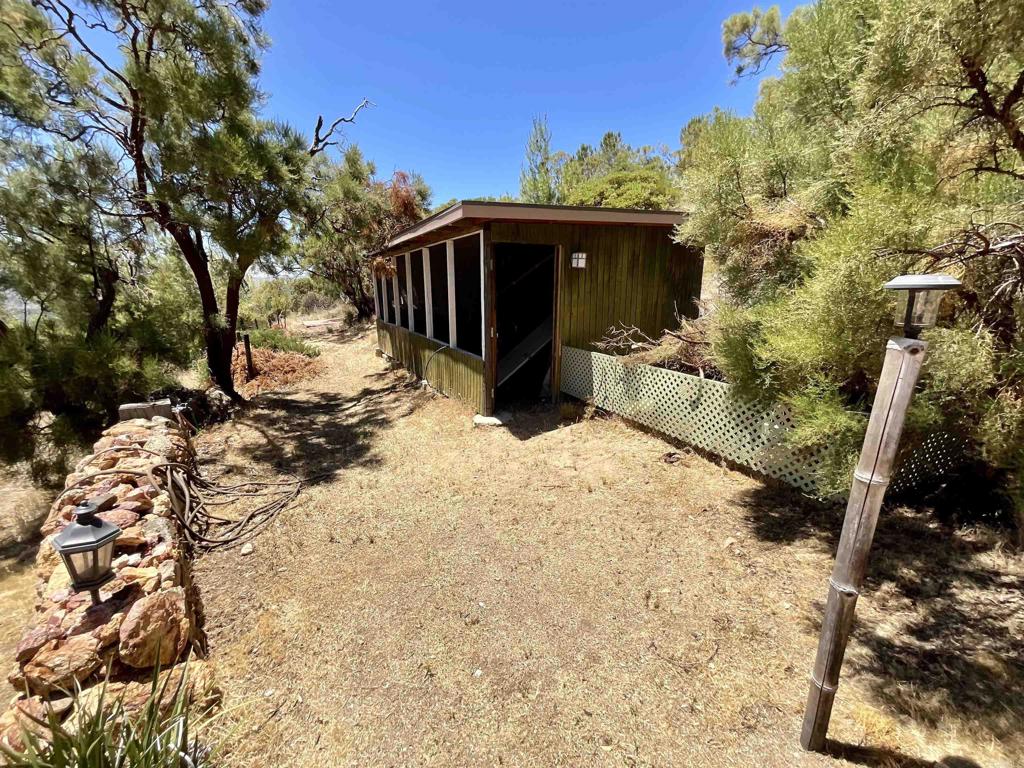 38281 Western Hills Road Anza, CA 92539 - Photo 40 of 75 a view of a house with a yard covered in snow