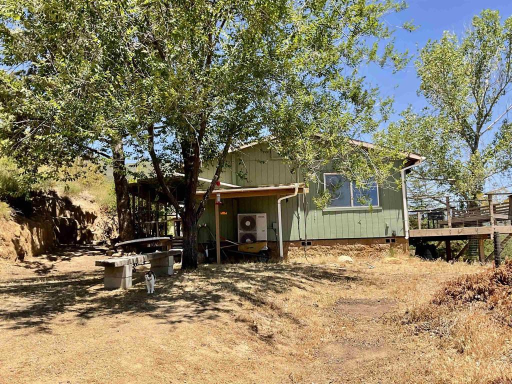 38281 Western Hills Road Anza, CA 92539 - Photo 41 of 75 a front view of a house with a yard covered with snow