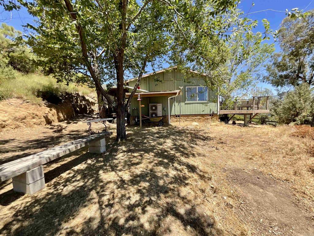38281 Western Hills Road Anza, CA 92539 - Photo 48 of 75 a front view of a house with a yard