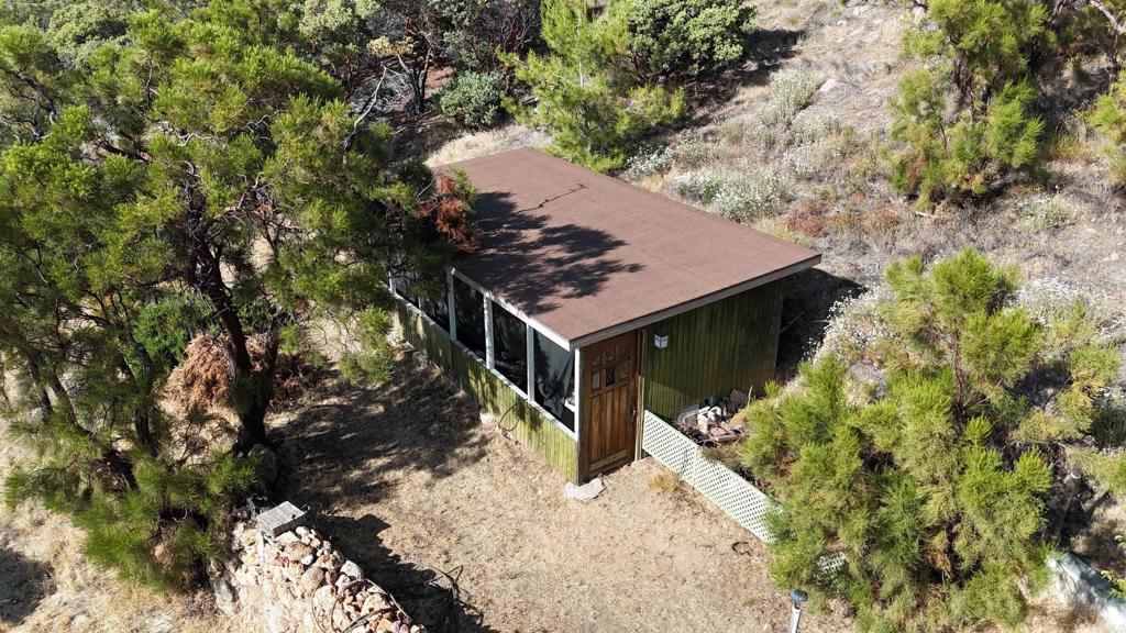 38281 Western Hills Road Anza, CA 92539 - Photo 56 of 75 a view of a tree in front of a house