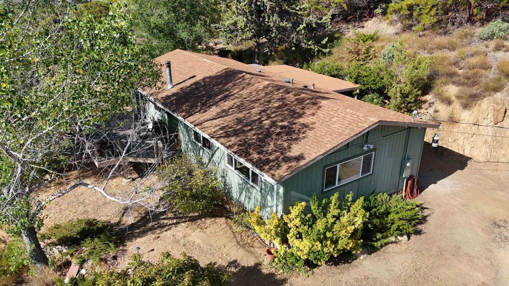 38281 Western Hills Road Anza, CA 92539 - Photo 71 of 75 a view of a wooden house with a yard