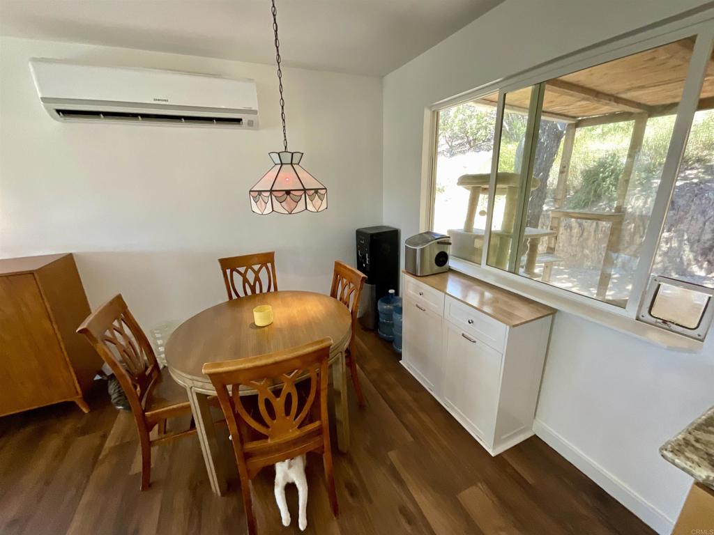 38281 Western Hills Road Anza, CA 92539 - Photo 10 of 75 a view of a dining room with furniture window and outside view
