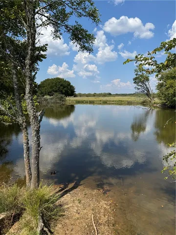 a view of a lake from a balcony