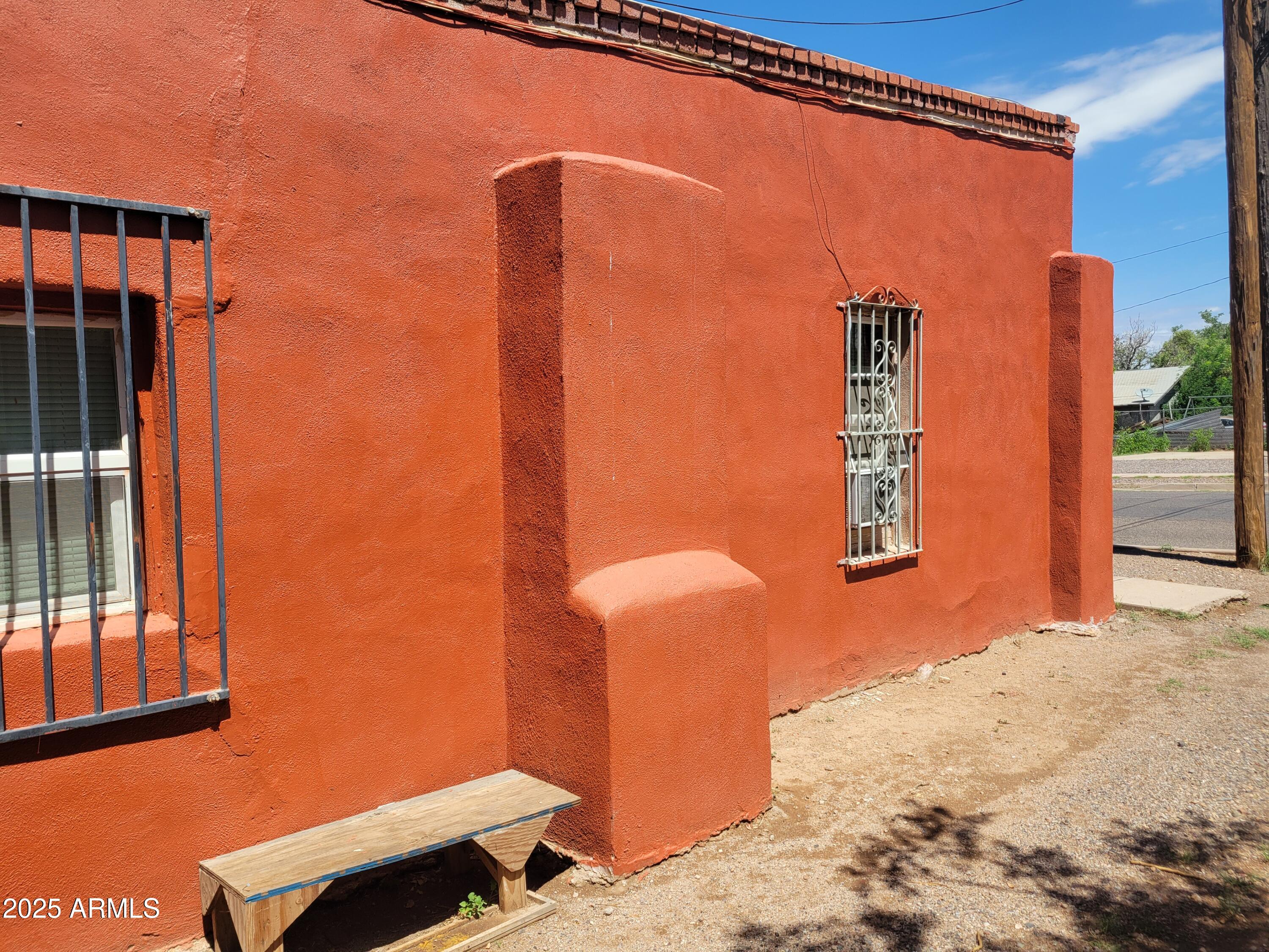 335 North G Avenue Douglas, AZ 85607 - Photo 14 of 20 a front view of a house with a yard