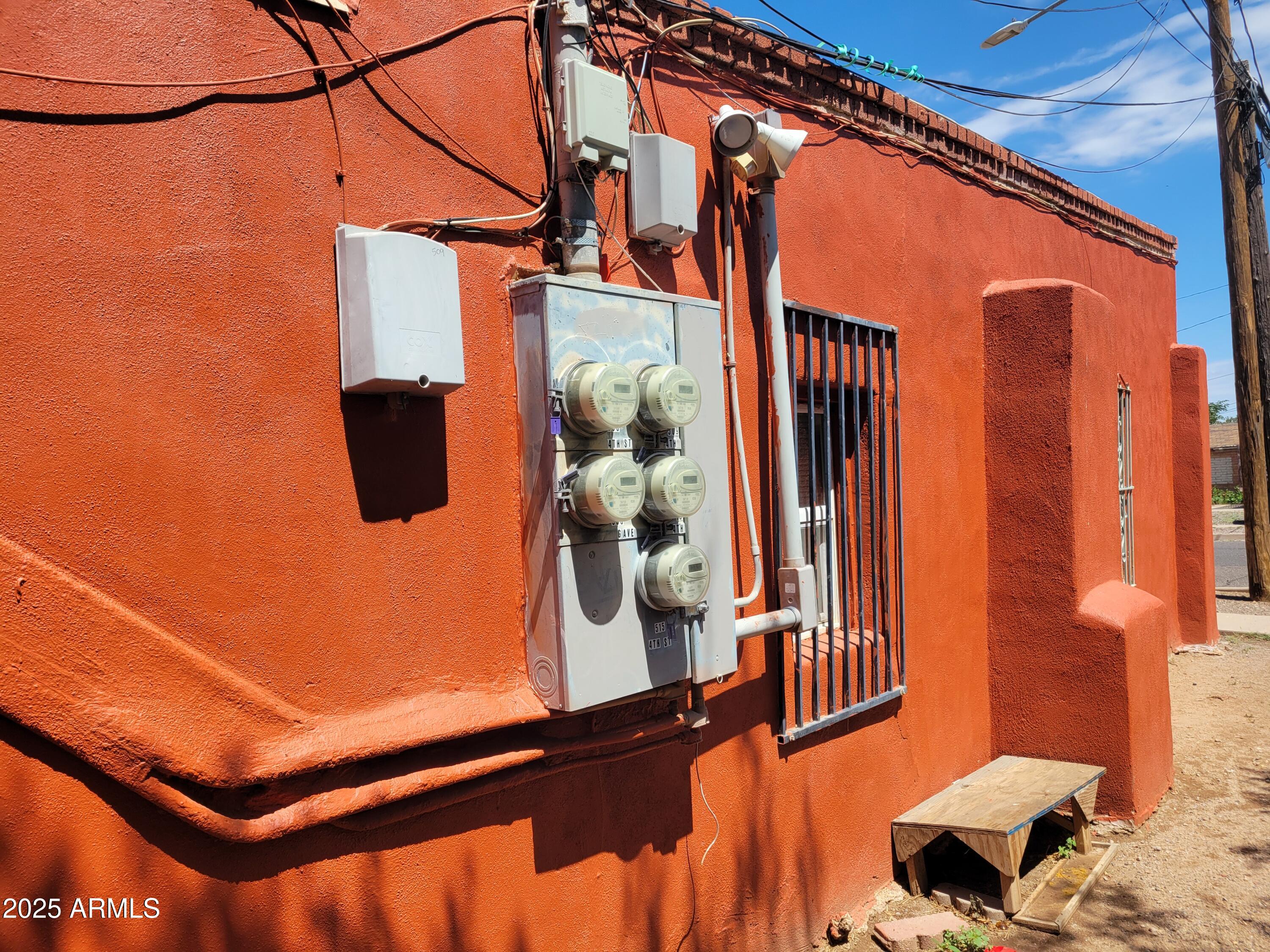 335 North G Avenue Douglas, AZ 85607 - Photo 15 of 20 a blue sign that is sitting on a brick wall