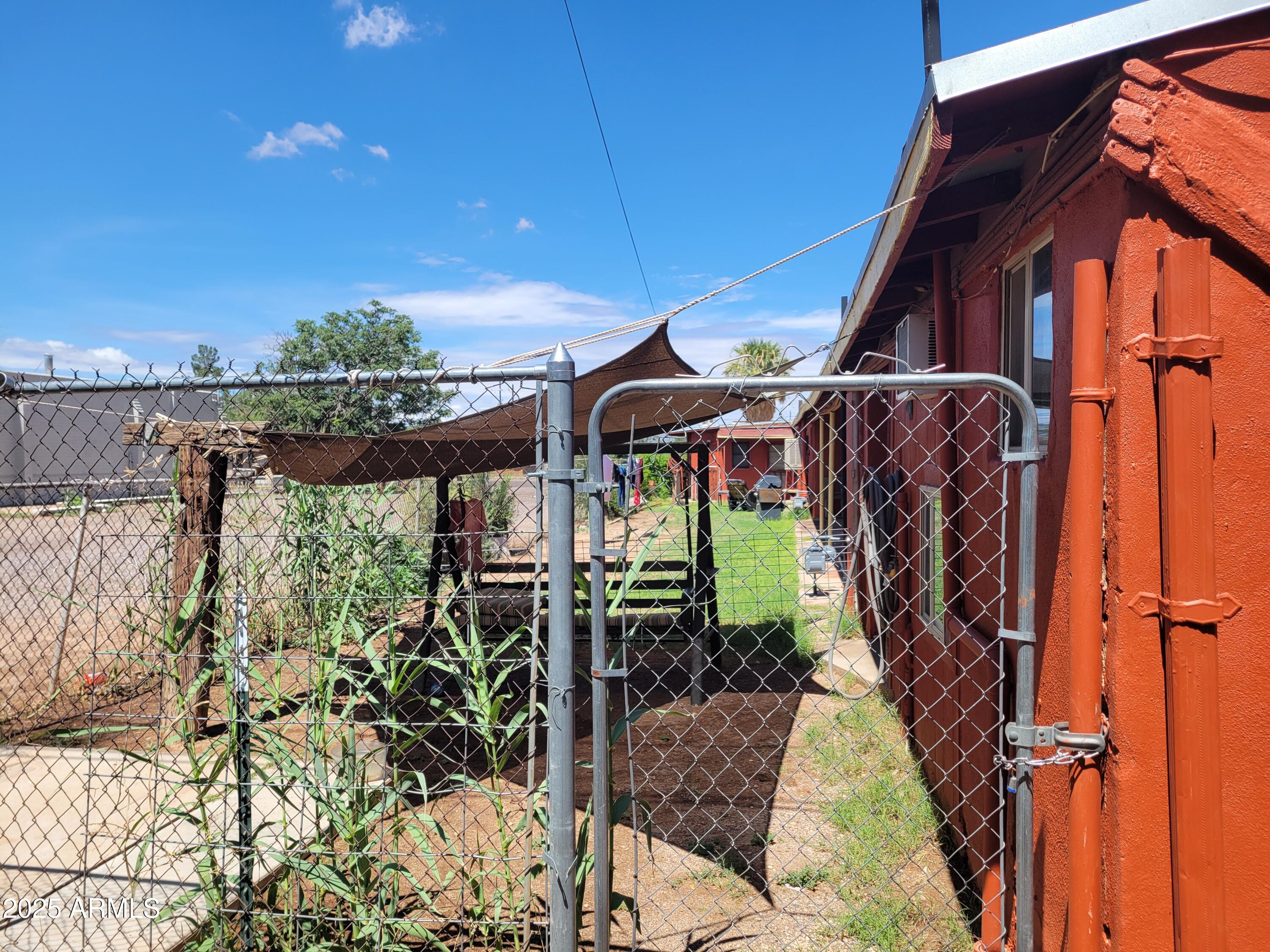 335 North G Avenue Douglas, AZ 85607 - Photo 16 of 20 a front view of a house with garden