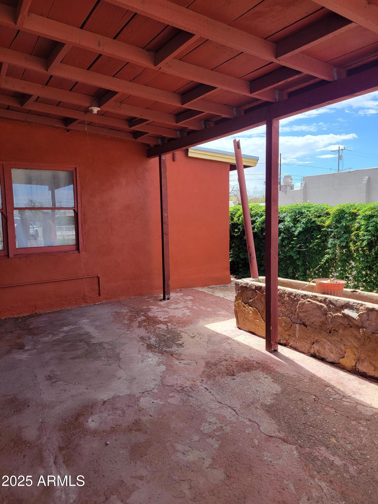 335 North G Avenue Douglas, AZ 85607 - Photo 5 of 20 a view of a room with wooden walls