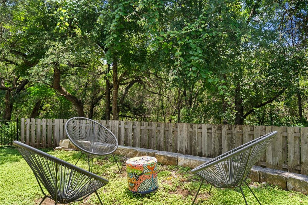 12200 Tawny Farms Road, Unit 139 Austin, TX 78748 - Photo 26 of 30 There’s plenty of room for a lounge chair to soak up the sun, and a nice level lawn for pets or a small garden.