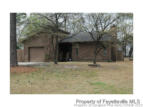 599 Moriston Road Fayetteville, NC 28314 - Photo 1 of 8 a black and white photo of a house