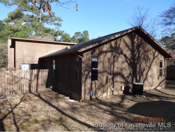 599 Moriston Road Fayetteville, NC 28314 - Photo 2 of 8 a view of a house with a tree