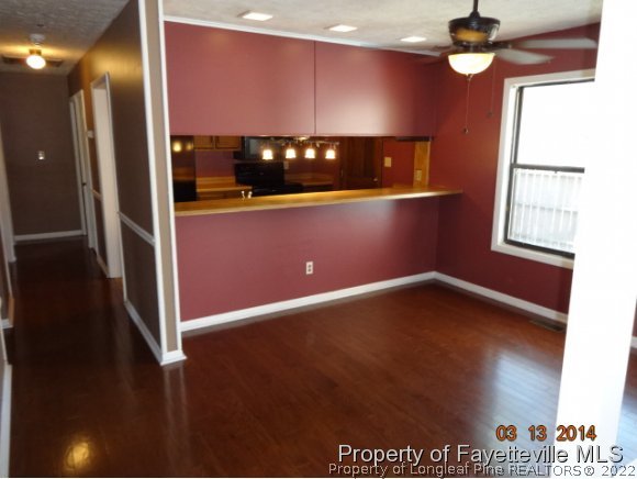 599 Moriston Road Fayetteville, NC 28314 - Photo 4 of 8 a view of an empty room with a window