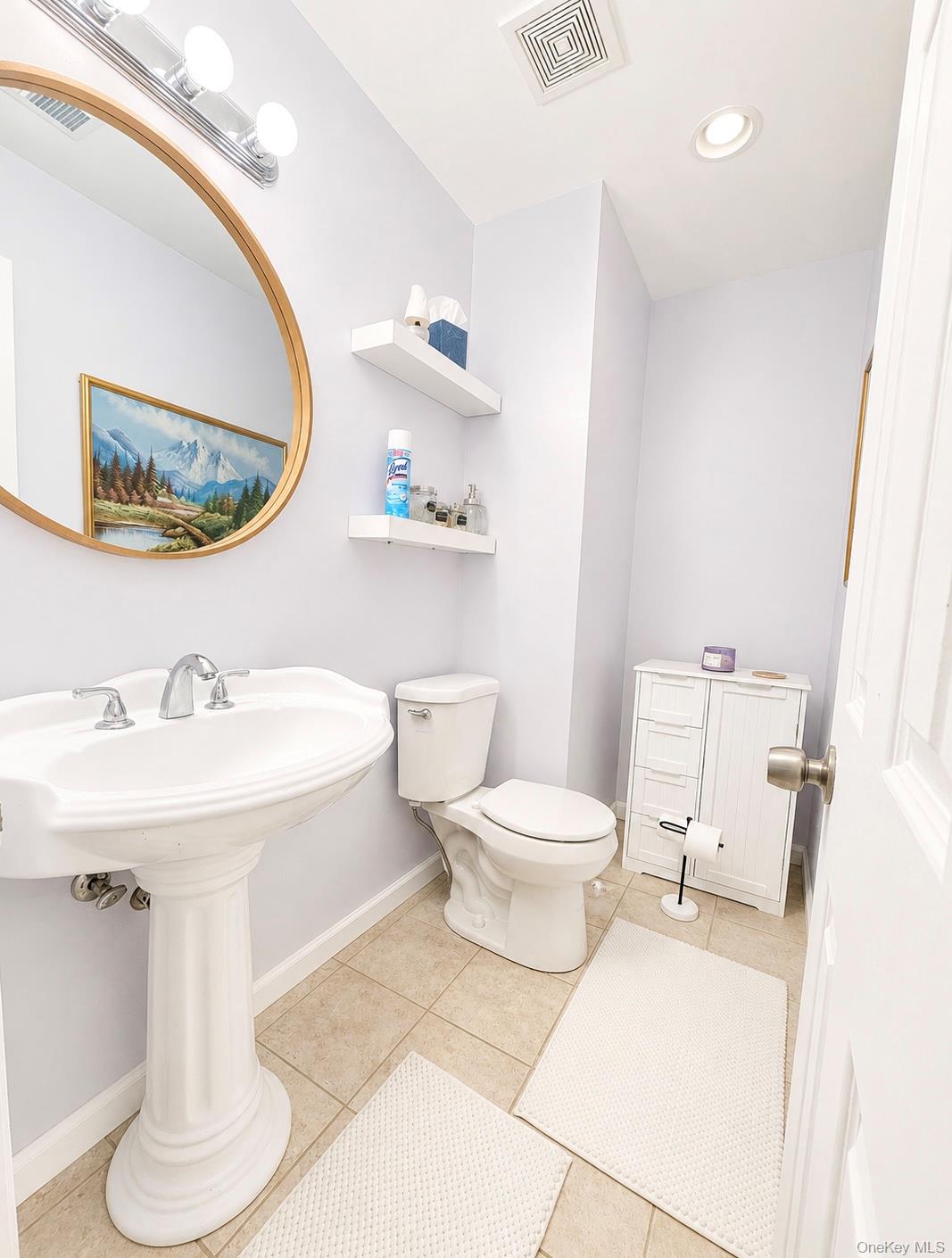 25 Rosman Road Thiells, NY 10984 - Photo 9 of 11 a bathroom with a sink toilet and a mirror