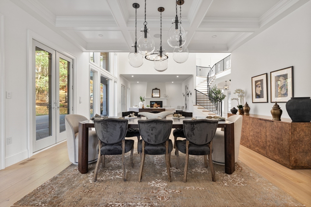 335 Heath Street Brookline, MA 02467 - Photo 13 of 38 a view of a dining room with furniture and chandelier