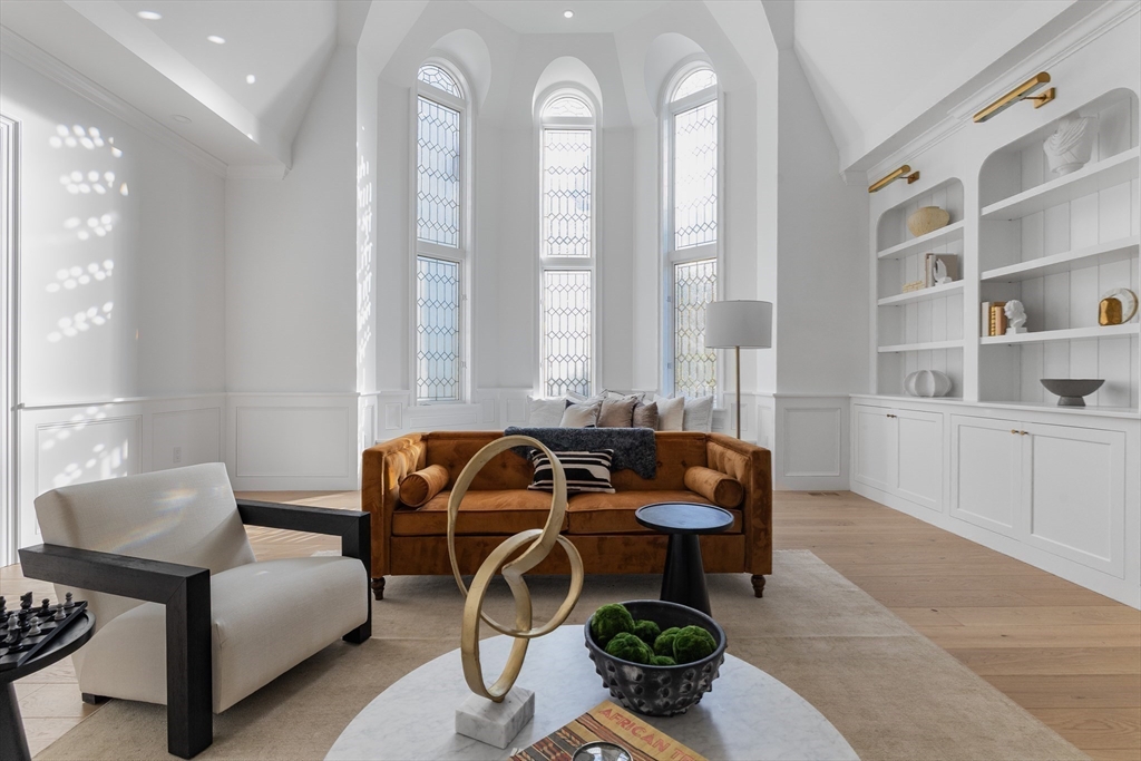 335 Heath Street Brookline, MA 02467 - Photo 21 of 38 a view of a livingroom with furniture and windows
