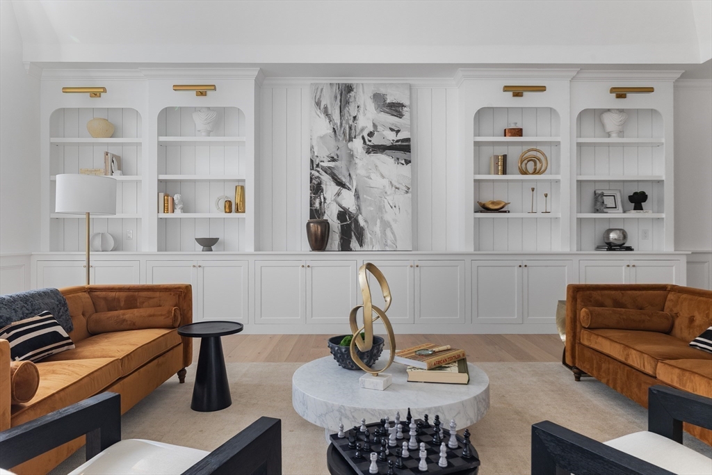 335 Heath Street Brookline, MA 02467 - Photo 22 of 38 a living room with furniture cabinets and window