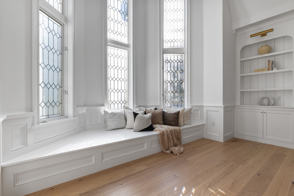 335 Heath Street Brookline, MA 02467 - Photo 23 of 38 a living room with furniture and windows