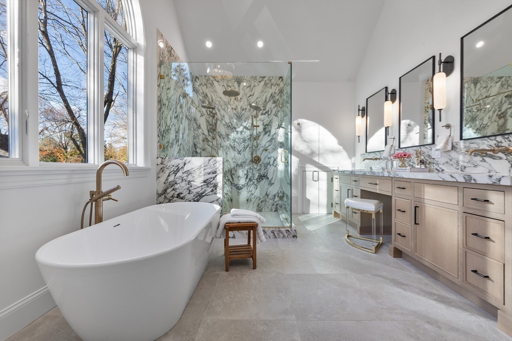 335 Heath Street Brookline, MA 02467 - Photo 27 of 38 a spacious bathroom with a bathtub sink and toilet