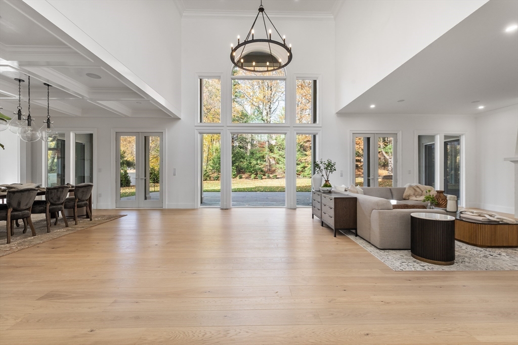 335 Heath Street Brookline, MA 02467 - Photo 3 of 38 a view of a dining room with furniture window chandelier