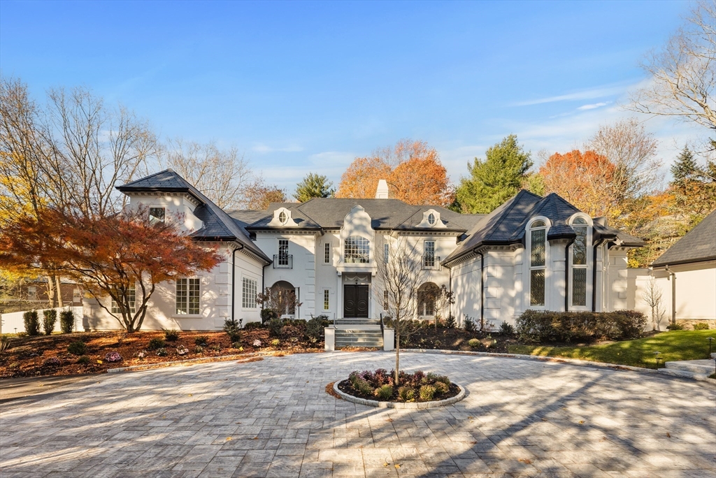 335 Heath Street Brookline, MA 02467 - Photo 32 of 38 a front view of a house with a yard