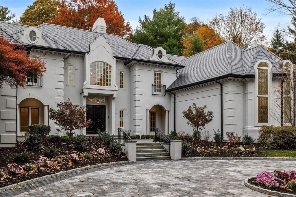 335 Heath Street Brookline, MA 02467 - Photo 33 of 38 a front view of a house with a garden