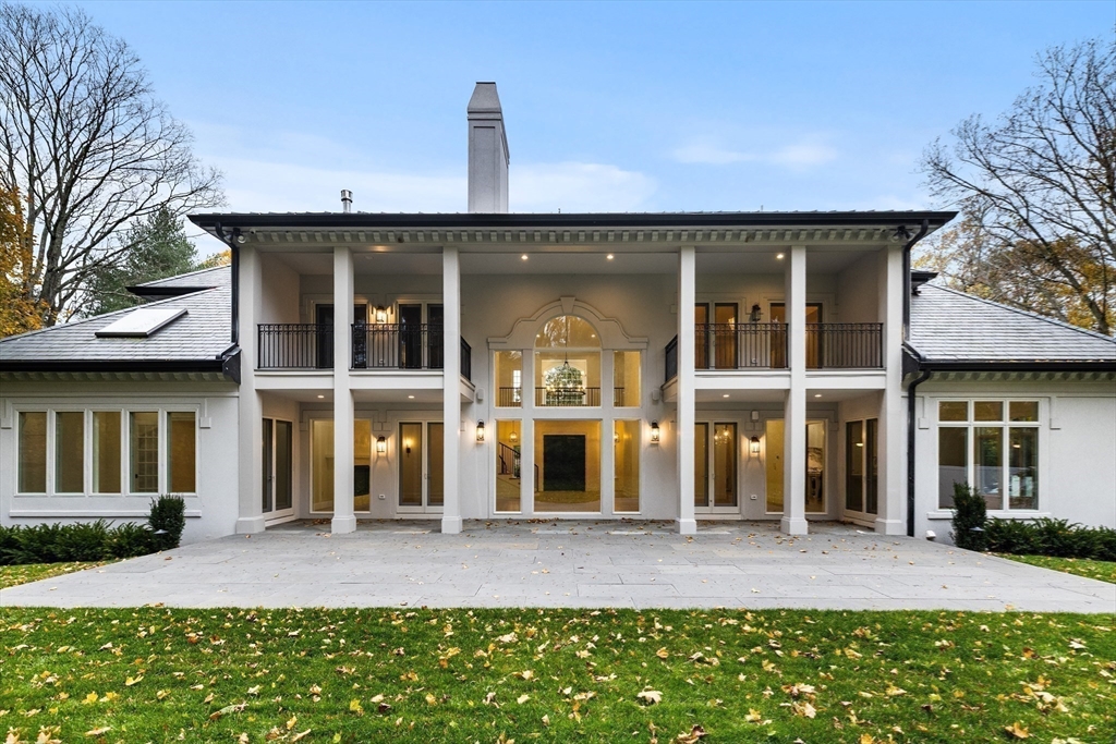 335 Heath Street Brookline, MA 02467 - Photo 37 of 38 a front view of a house with a yard