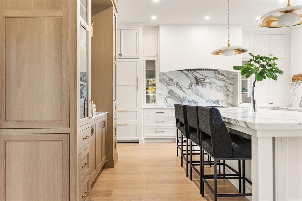 335 Heath Street Brookline, MA 02467 - Photo 7 of 38 a view of kitchen with furniture and refrigerator